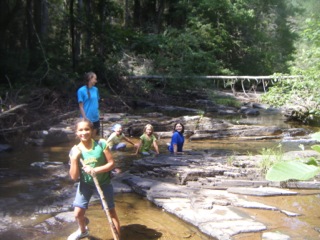 4H Nature Nuts cleaning their adopted stream, Lewis Creek, in Gypsy Hill Park in April